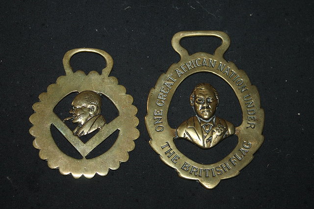 Appraisal: TWO HORSE BRASSES one showing Winston Churchill smoking a cigar