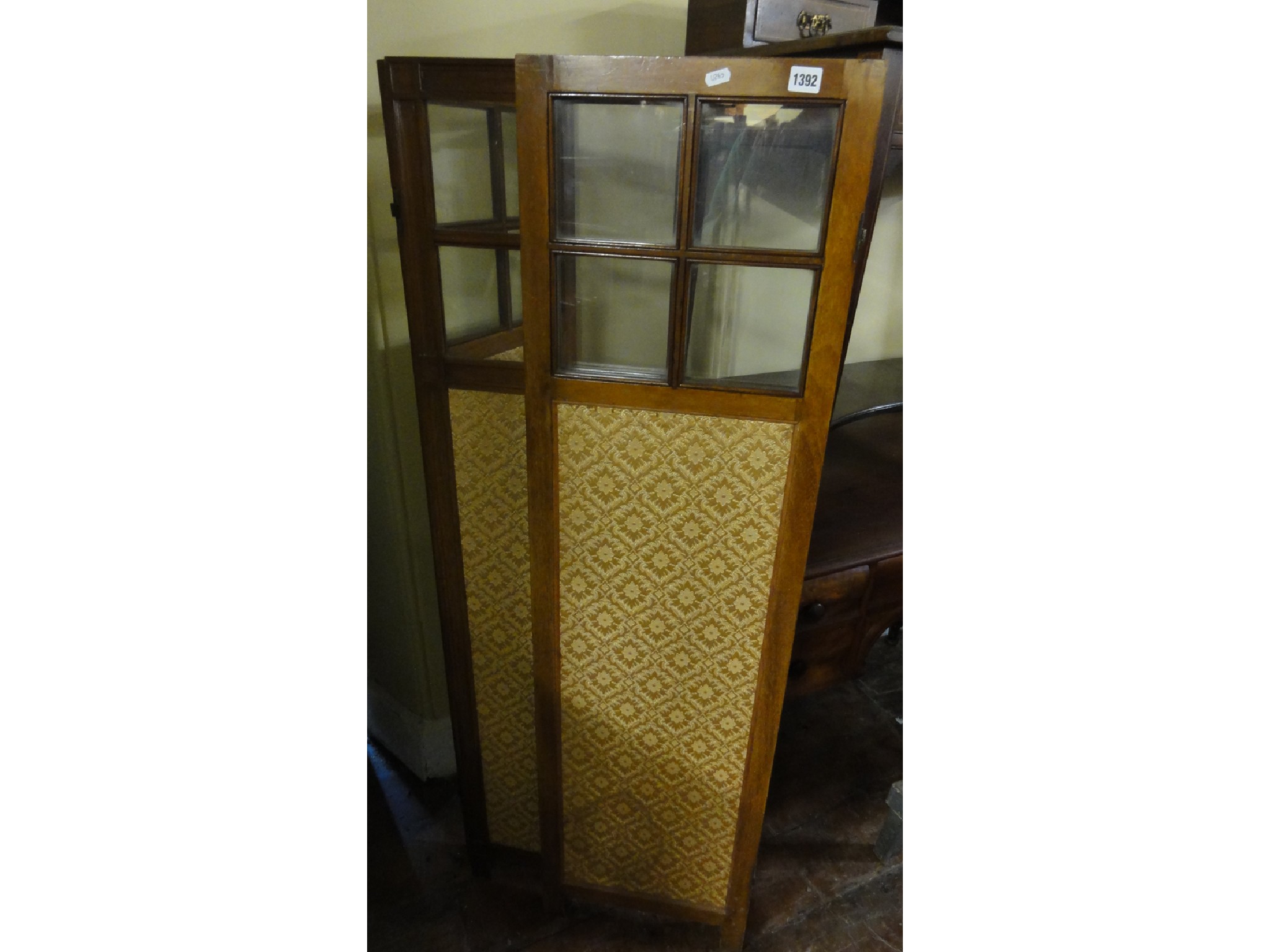 Appraisal: An Edwardian mahogany three fold room divider of three quarter