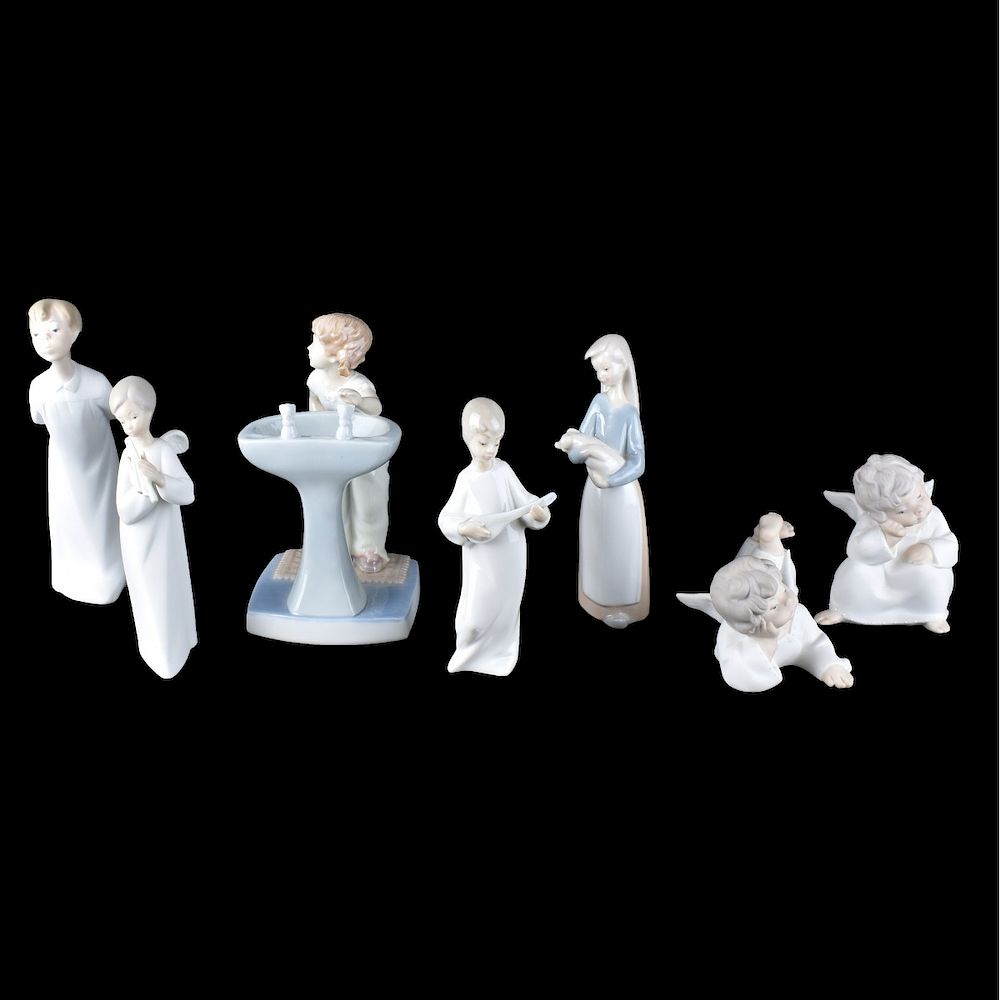 Appraisal: Lladro and Nau Figurines Grouping of Seven Lladro and Nau