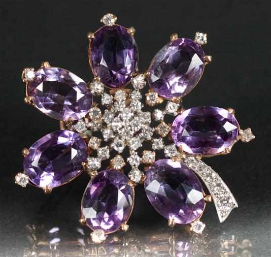 Appraisal: Lady's K yellow gold diamond and amethyst flower-form pendant-brooch grams