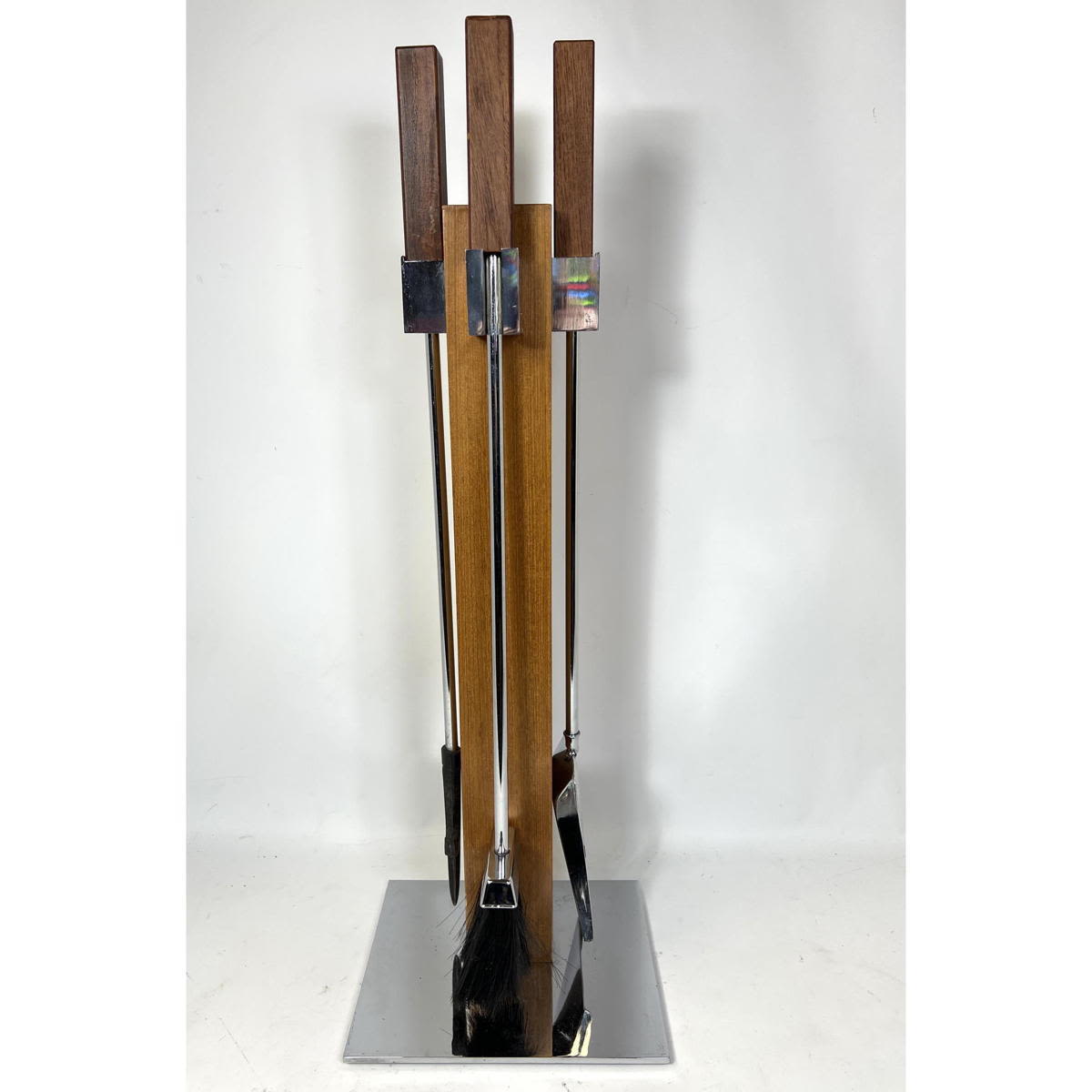 Appraisal: Alessandro Albrizzi Style teak and chrome fire tools Dimensions H