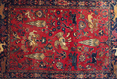 Appraisal: PERSIAN Directional area rug with animals birds and trees in