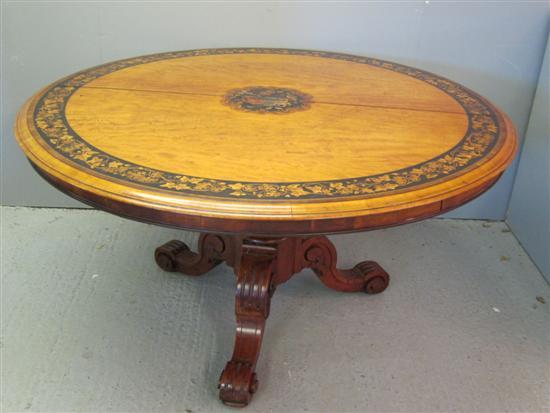 Appraisal: th century satinwood marquetry inlaid and crossbanded breakfast table the