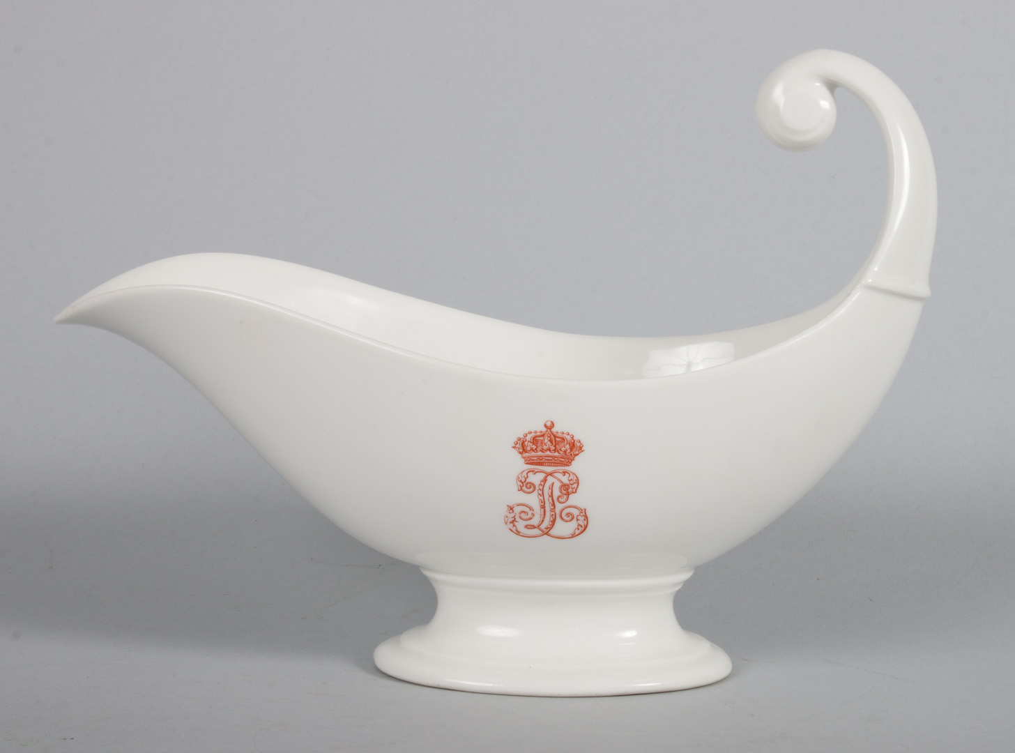 Appraisal: Sevres porcelain sauce boat dated white porcelain body with red