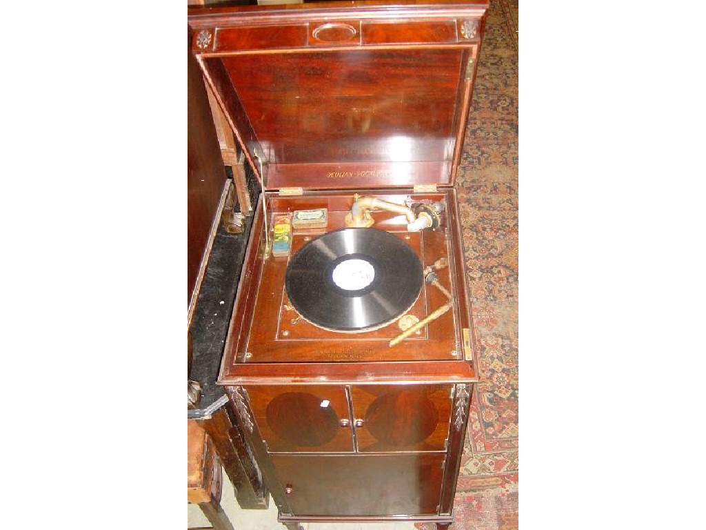 Appraisal: An Edwardian walnut cased gramaphone cabinet by Aeolian of New