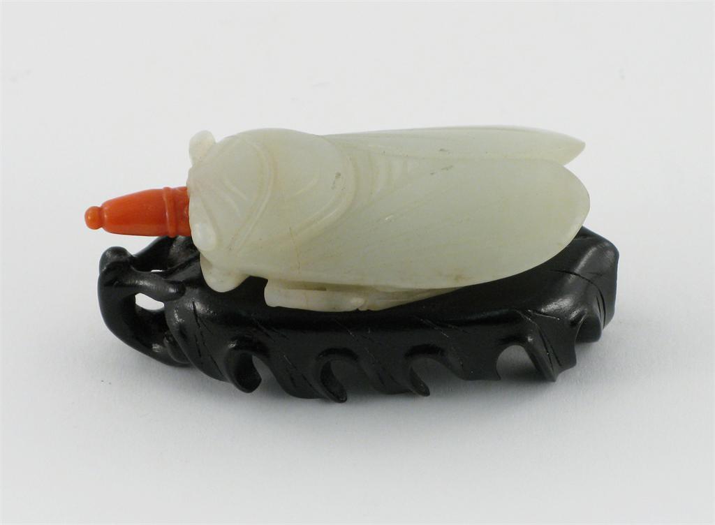 Appraisal: A Chinese pale celadon jade carving of a cicada