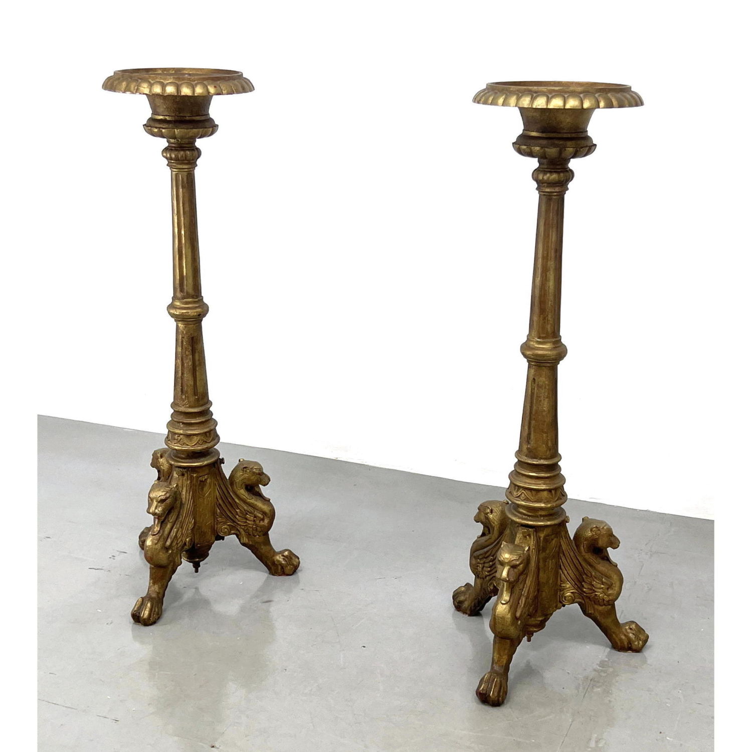 Appraisal: Pair heavy Lion footed Iron candle holders gold painted Pricket