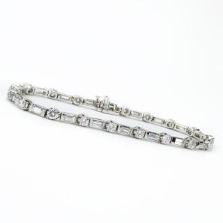 Appraisal: Approx Carat Round Brilliant and Baguette Cut Diamond and Platinum