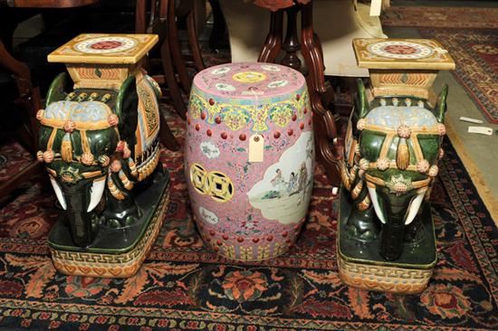 Appraisal: THREE ORIENTAL GARDEN SEATS A pair of polychrome elephant garden