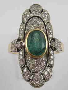 Appraisal: A yellow metal tests ct gold emerald and diamond ring