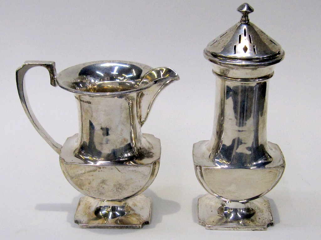 Appraisal: Silver sugar castor with matching cream jug Birmingham