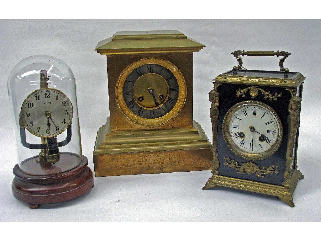 Appraisal: An electric powered eight hundred day clock -