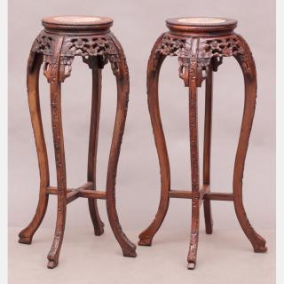 Appraisal: A Pair of Chinese Carved Hardwood Stands with Marble Inset