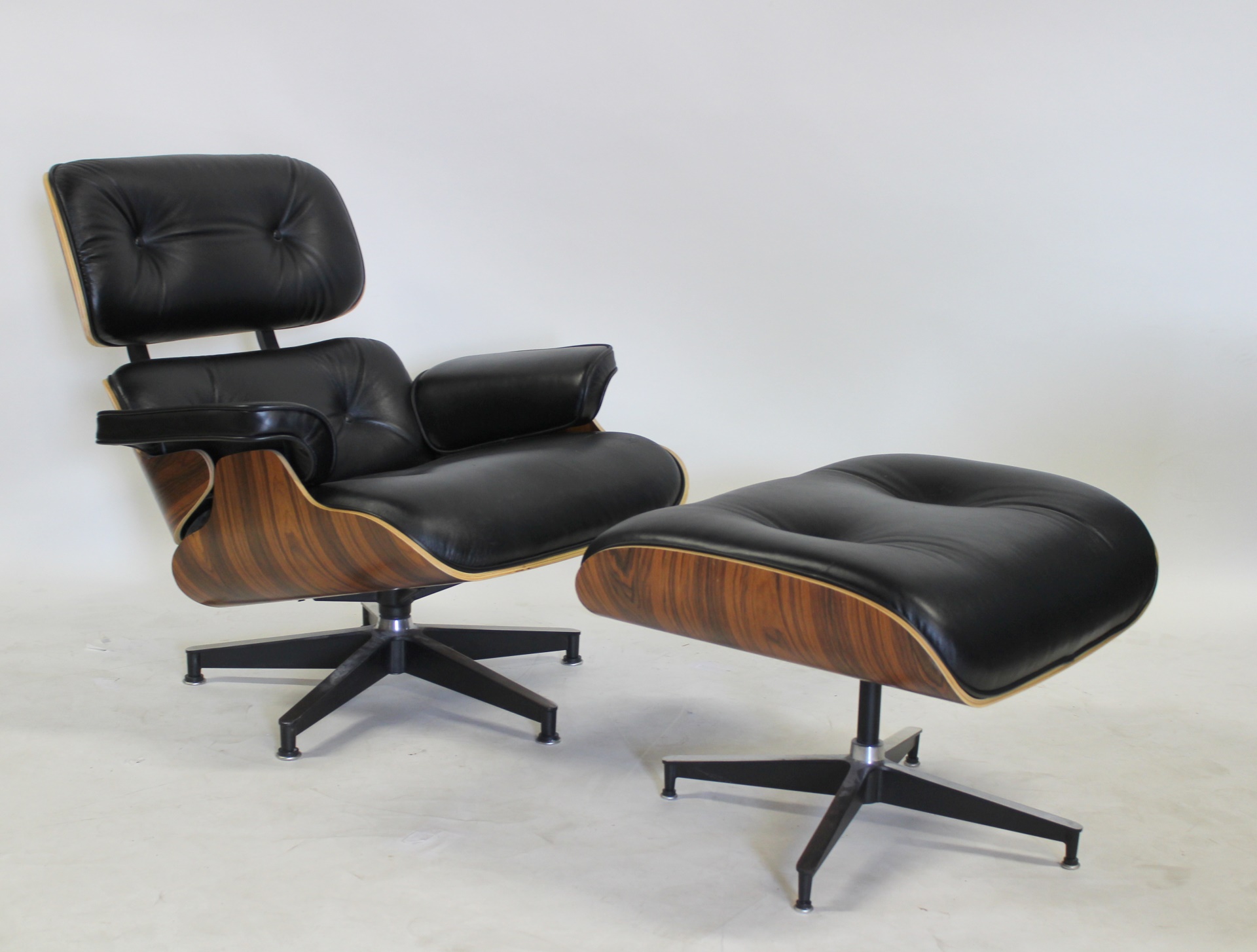 Appraisal: EAMES STYLE LOUNGE CHAIR AND OTTOMAN Nice quality and leather