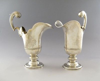 Appraisal: A pair of electroplated ewers in the early th century