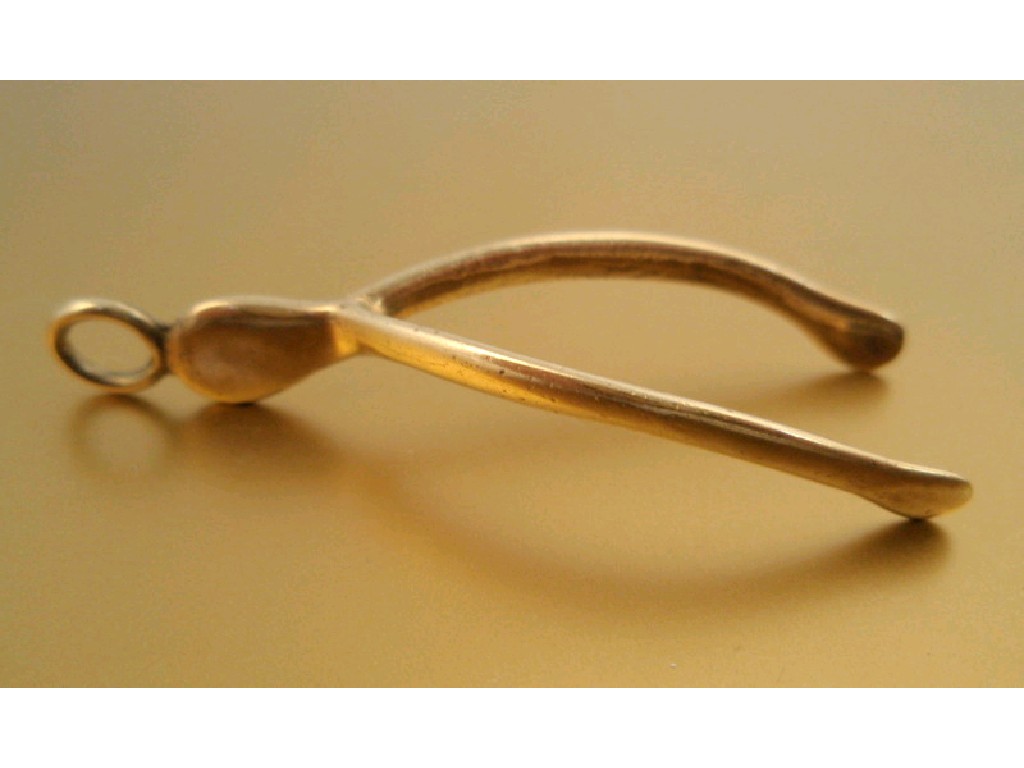 Appraisal: A ct gold wishbone pendant London assay g