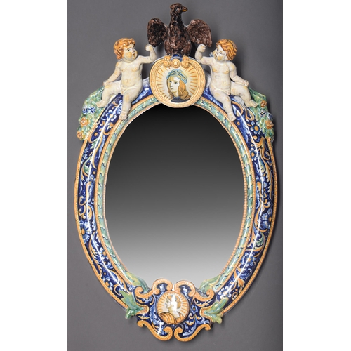 Appraisal: An Italian maiolica mirror late th c the oval frame