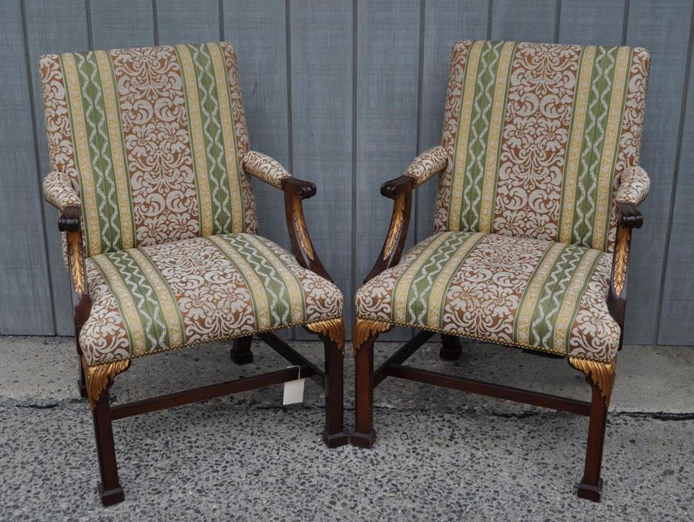 Appraisal: Pair Chippendale Style Upholstered Arm Chairs with gilt accents block