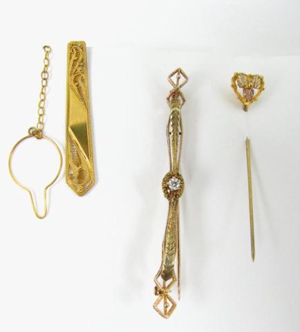 Appraisal: Three gold fashion accessories including bar pin marked 'S K'