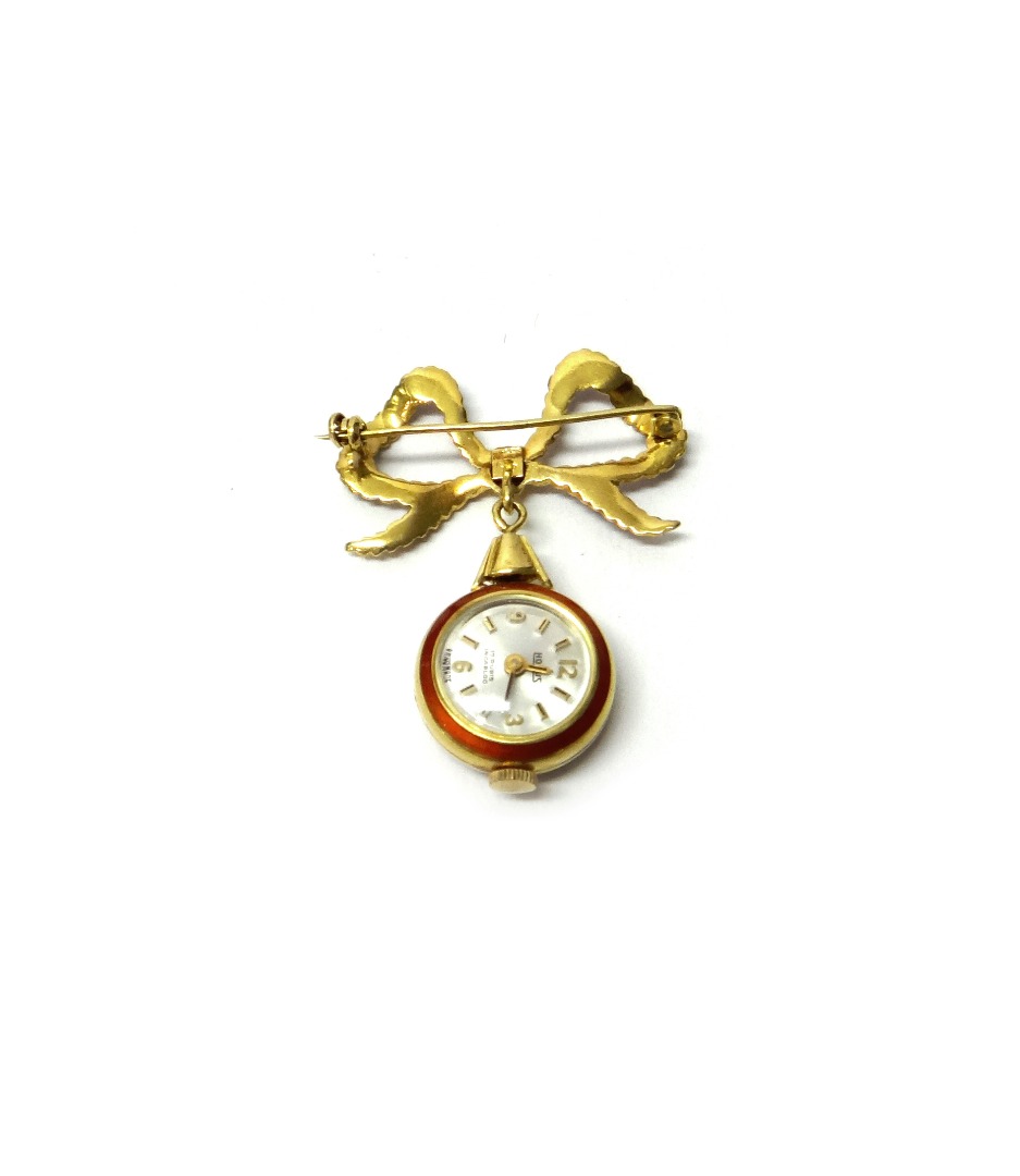 Appraisal: A lady's gold cased and red enamelled openfaced brooch watch