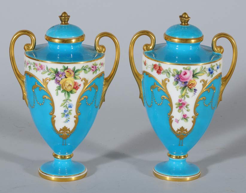 Appraisal: Pair of Minton Porcelain Covered Urns high late th centuryCondition