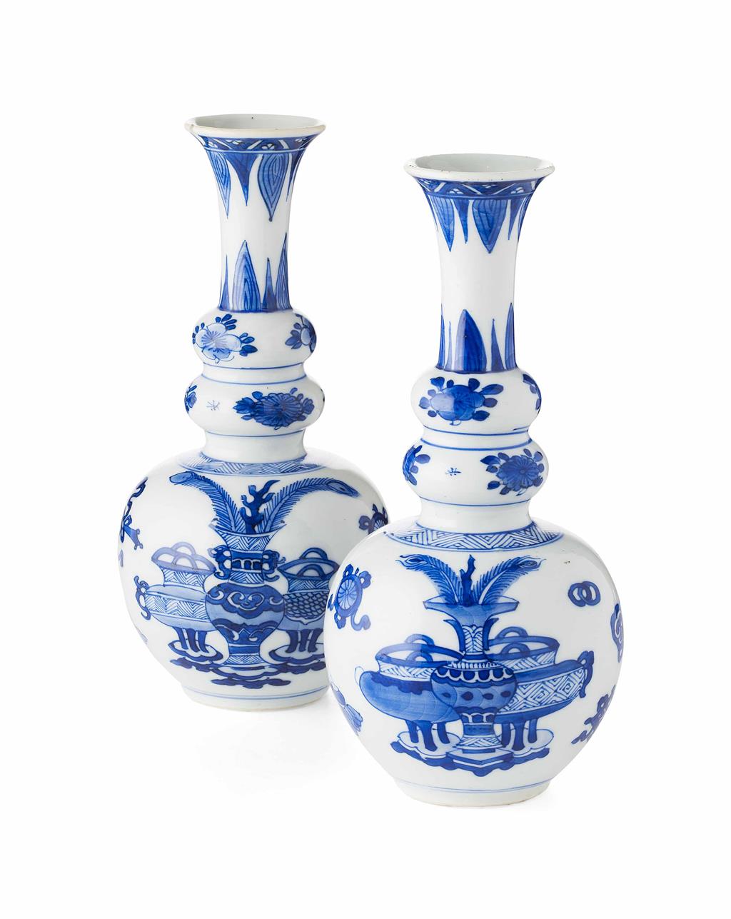 Appraisal: PAIR OF BLUE AND WHITE VASES KANGXI PERIOD of globular