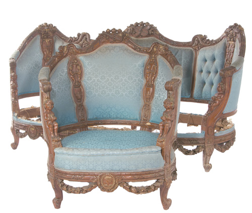 Appraisal: VICTORIAN PARLOR SET Settee and chair frames both highly ornamented