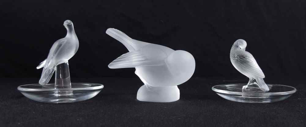 Appraisal: LALIQUE CRYSTAL SPARROW AND RING HOLDERS To include Sparrow etched