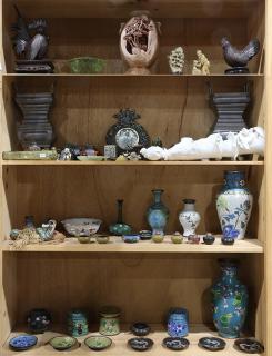 Appraisal: Four Shelves of Asian Decorative Items Four shelves of Asian