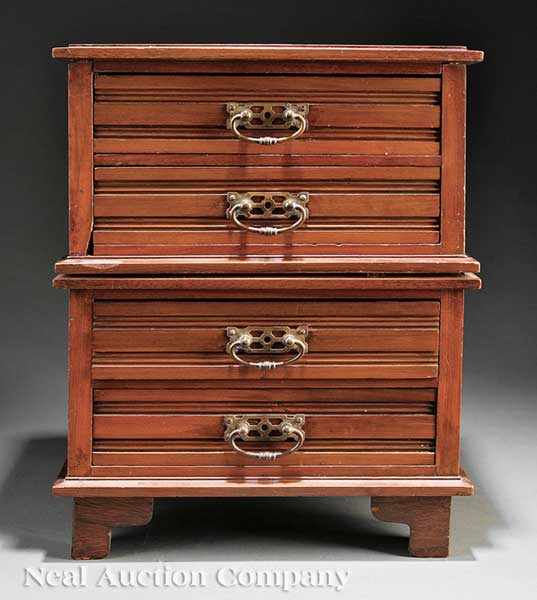 Appraisal: An English Miniature Mahogany Chest-on-Chest c molded top reeded drawers