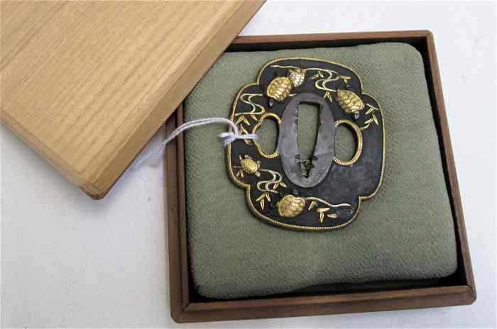 Appraisal: JAPANESE BRONZE TSUBA Samurai Daisho sword guard attributed to the