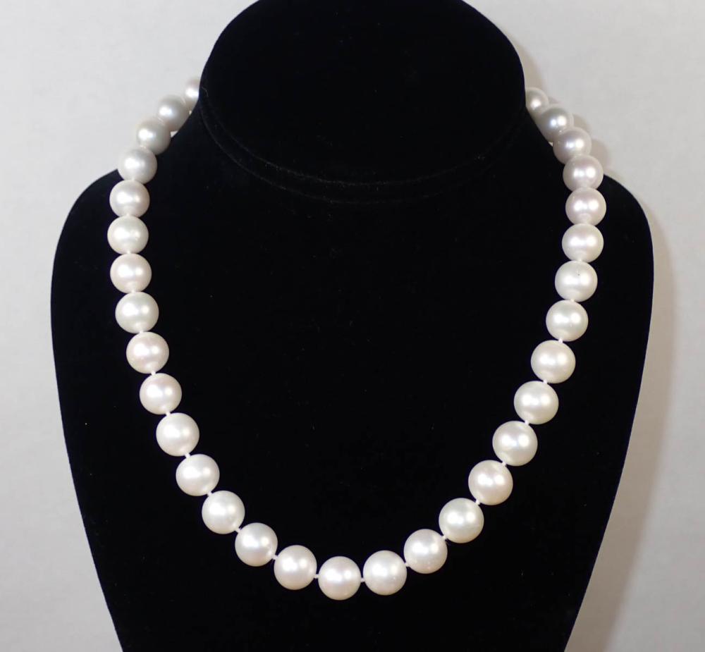 Appraisal: PRINCESS LENGTH PEARL AND FOURTEEN KARAT GOLD NECKLACE - hand-knotted