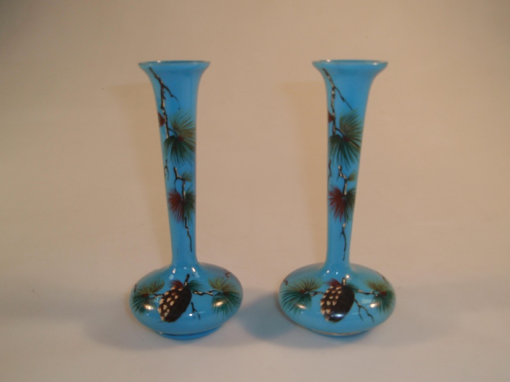 Appraisal: A pair of opaque turquoise glass bottle vases with everted