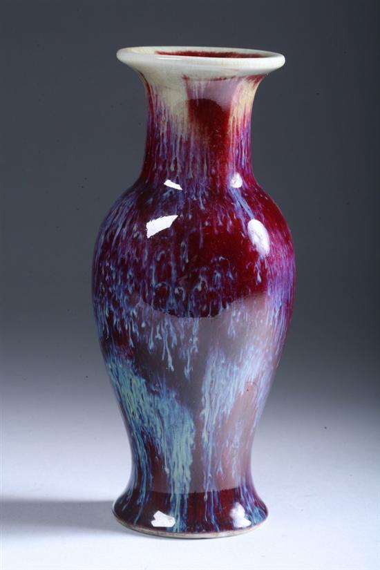 Appraisal: CHINESE FLAMB PORCELAIN VASE Qing Dynasty Baluster-form elongated neck everted