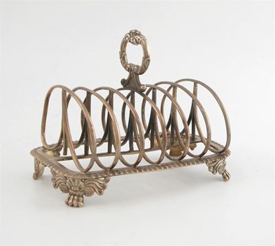 Appraisal: A George IV silver seven-bar toast rack by William Elliott