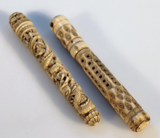 Appraisal: A thC Chinese ivory needle case the cylindrical body with