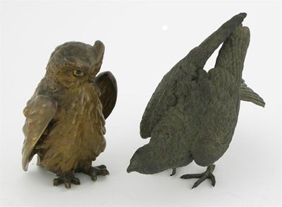 Appraisal: A bronze model of an owl glass eyes rubbed golden