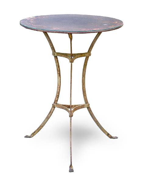 Appraisal: A Napoleon III patinated iron and t le bistro table