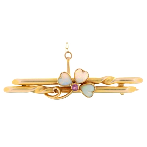 Appraisal: A heart shaped opal and ruby clover leaf bar brooch