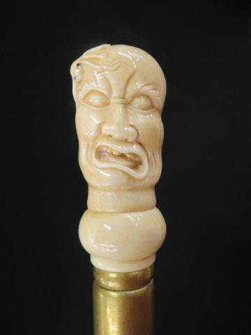 Appraisal: Carved Ivory or Bone Walking Stick bust of man with