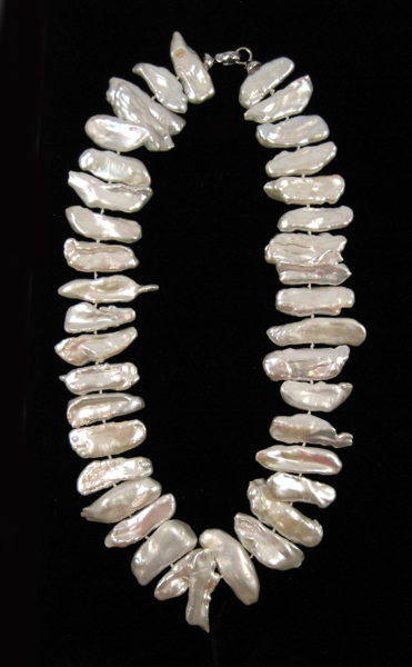 Appraisal: PRINCESS LENGTH WHITE PEARL NECKLACE measuring inches in length and