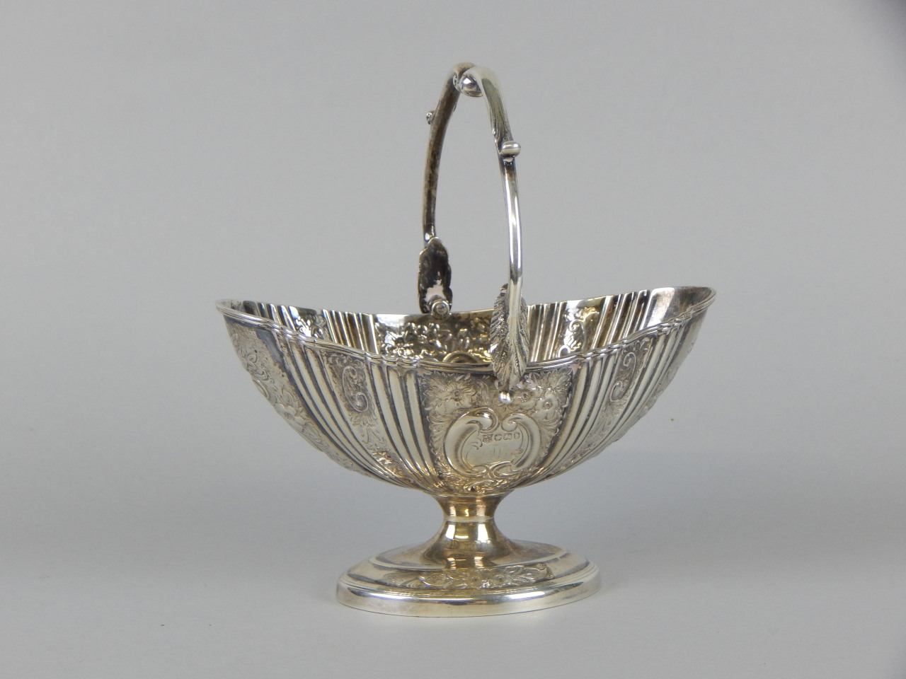 Appraisal: A Victorian sugar bowl with embossed floral decoration Sheffield oz