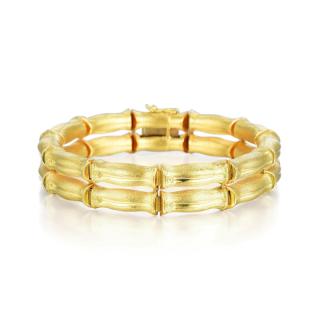 Appraisal: A Gold Bamboo Bracelet Featuring two rows of bamboo-shaped links