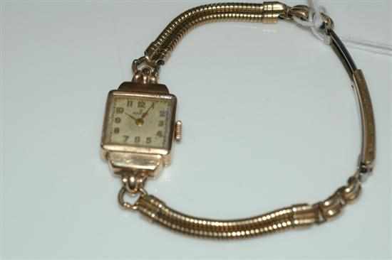 Appraisal: A LADIES ROLEX MANUAL WIND WRISTWATCH GILDED DIAL WITH ARABIC