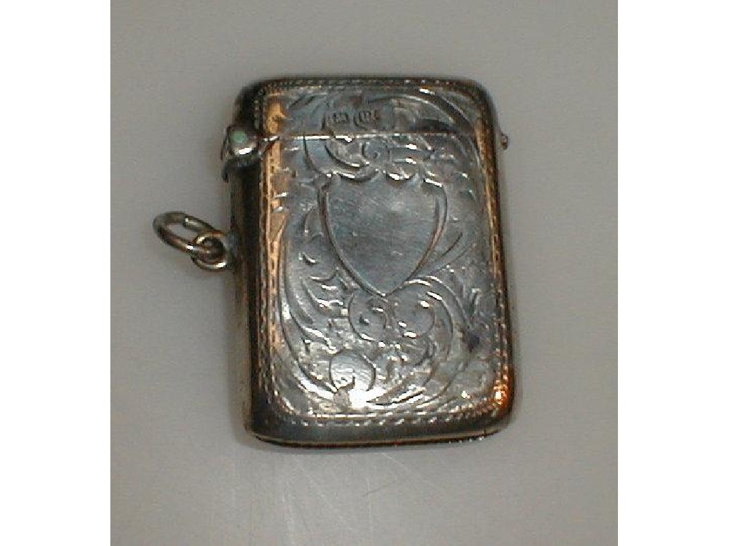 Appraisal: A silver vesta with scroll decoration and vacant cartouche Birmingham