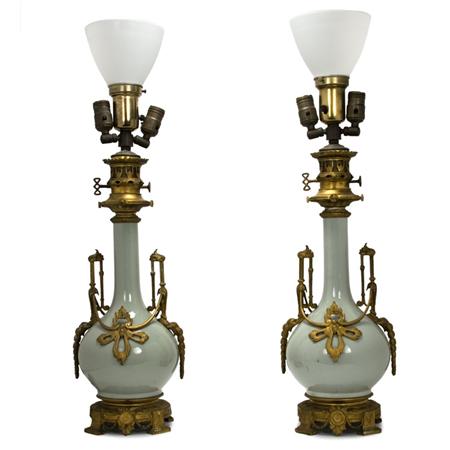 Appraisal: Pair of Louis XVI Style Gilt-Metal Mounted Glazed Porcelain Three-Light