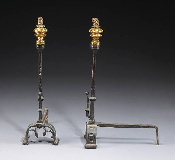 Appraisal: A pair of Renaissance style iron and gilt bronze andirons