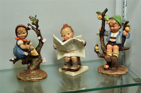 Appraisal: THREE HUMMEL FIGURINES ''Apple Tree Girl'' Base with Hummel crown