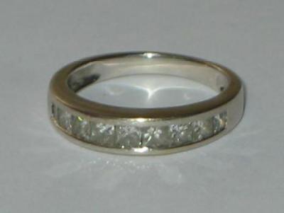 Appraisal: A DIAMOND HALF ETERNITY RING the ct white gold band