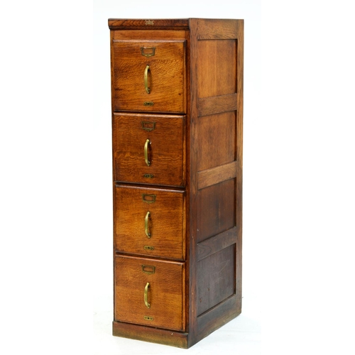 Appraisal: An oak office filing cabinet c of four moulded drawers